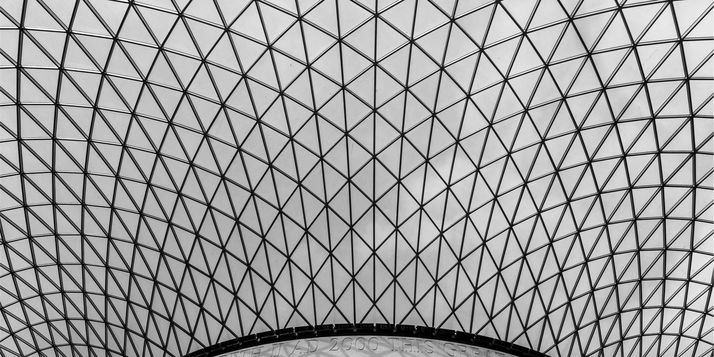 Curving glass and steel lattice roof - photo by Mika Ruusunen